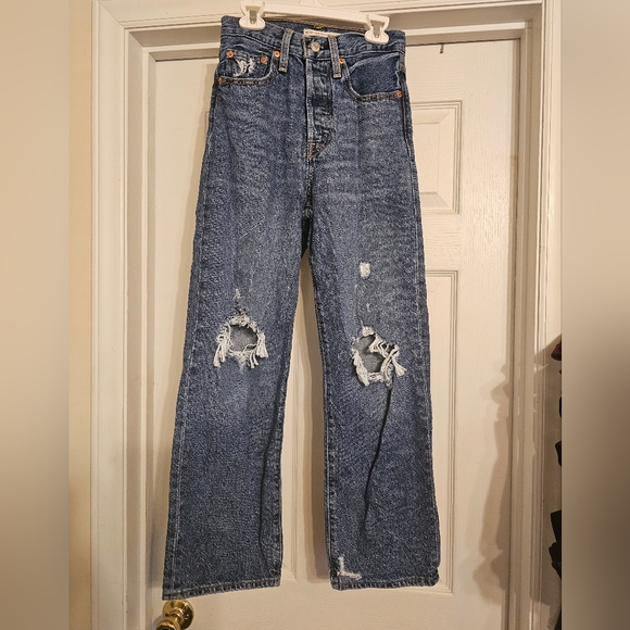 Levi's Denim - NWOT Blue Distressed Women's Jeans. Size: 24W 27L.